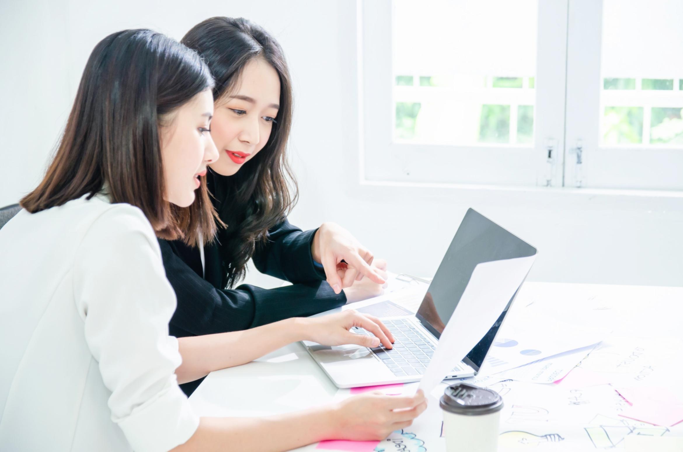 Modern workspace showing collaborative budget analysis environment