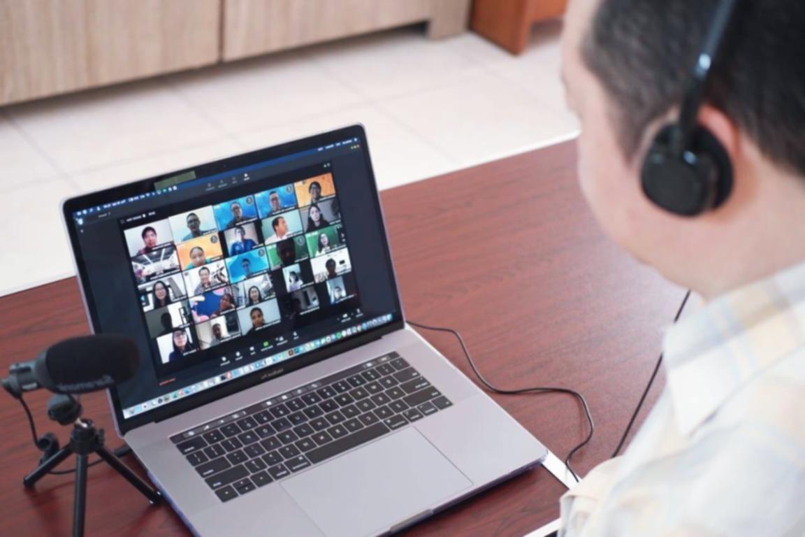 Finance professional reviewing budget reports in a focused workspace