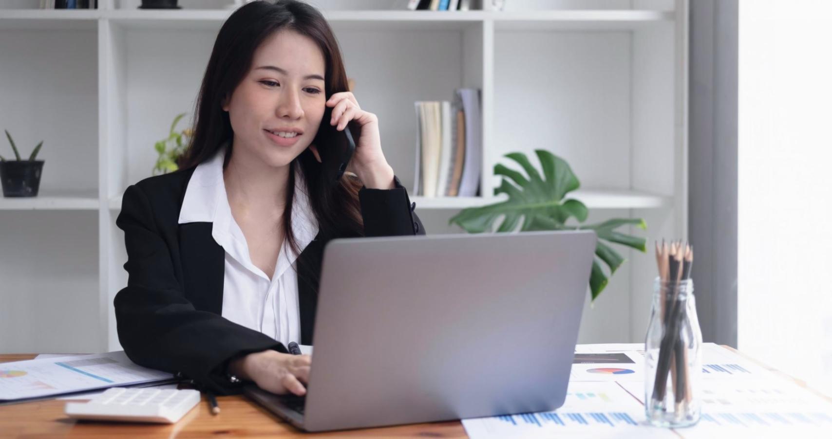 Business team analyzing financial reports and budget data